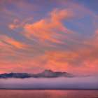 USA, Washington State, Seabeck. Fog layer at sunrise on Hood Canal and Olympic Mountains. Art Print